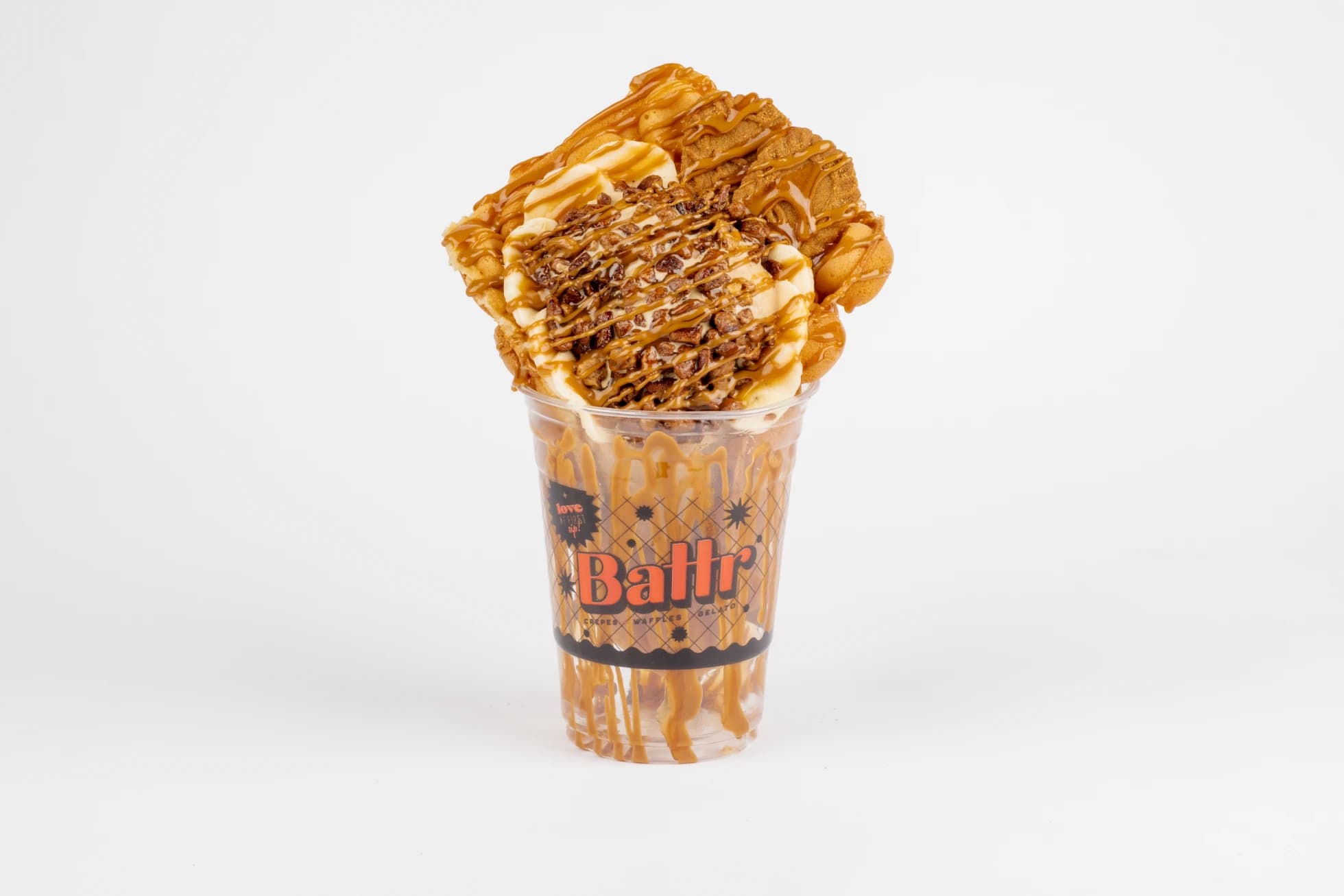 Cookie Butter Fosters bubble waffle with salted caramel gelato, bananas, candied pecans and Biscoff cookie butter.